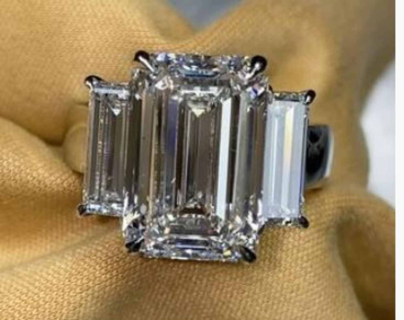 Emerald three-stone ring
